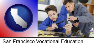 San Francisco, California - student studying auto mechanics at a vocational school